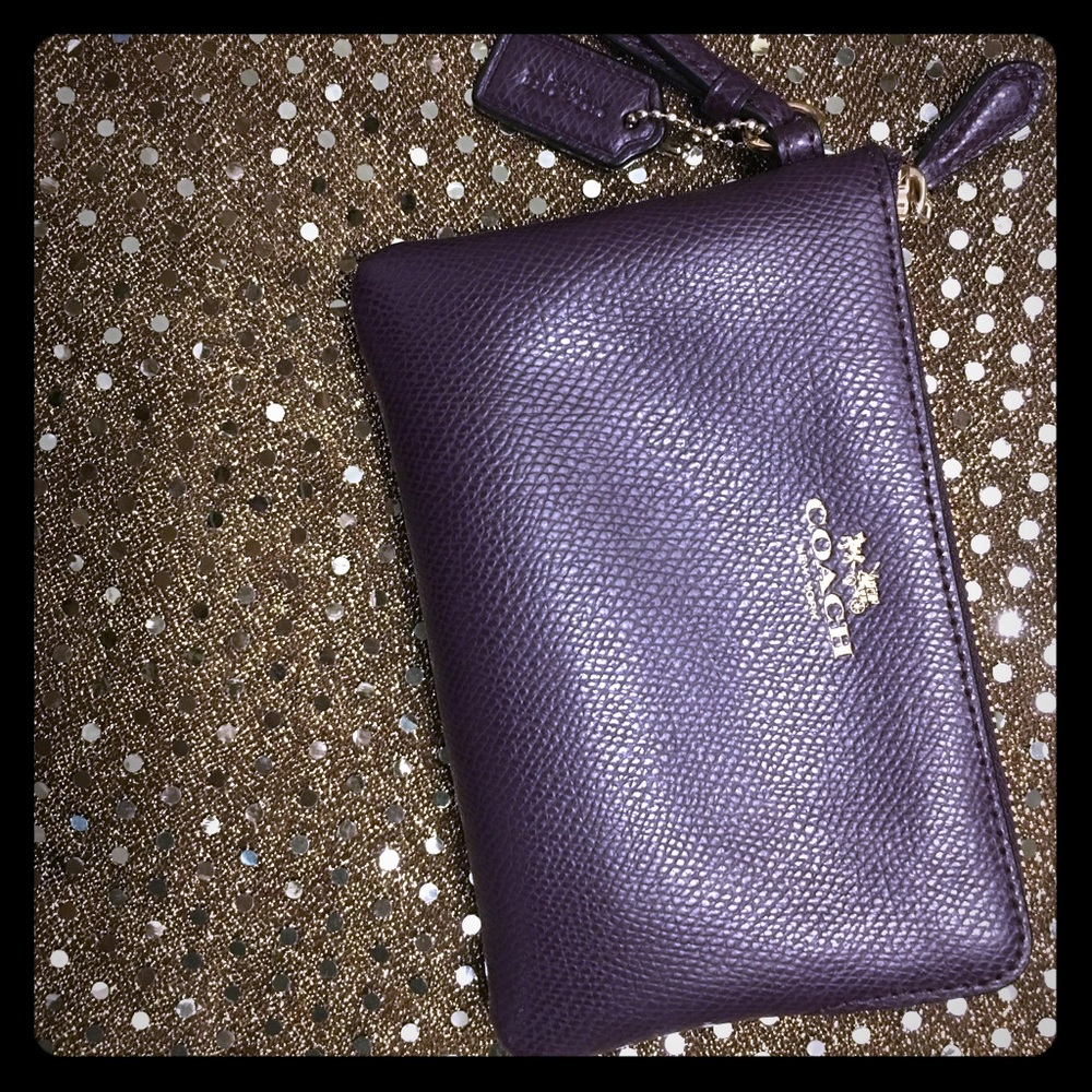 Coach wristlet, dark plum purple